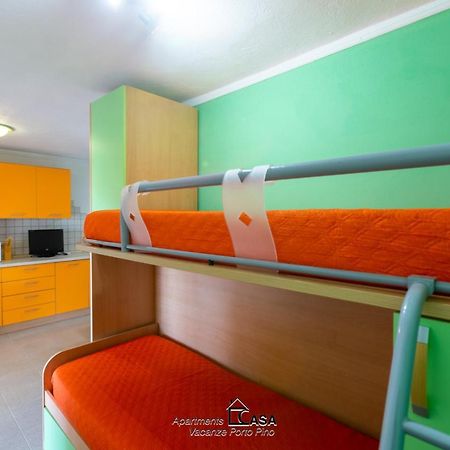 Apartments Casa Vacanze Porto Pino Buitenkant foto