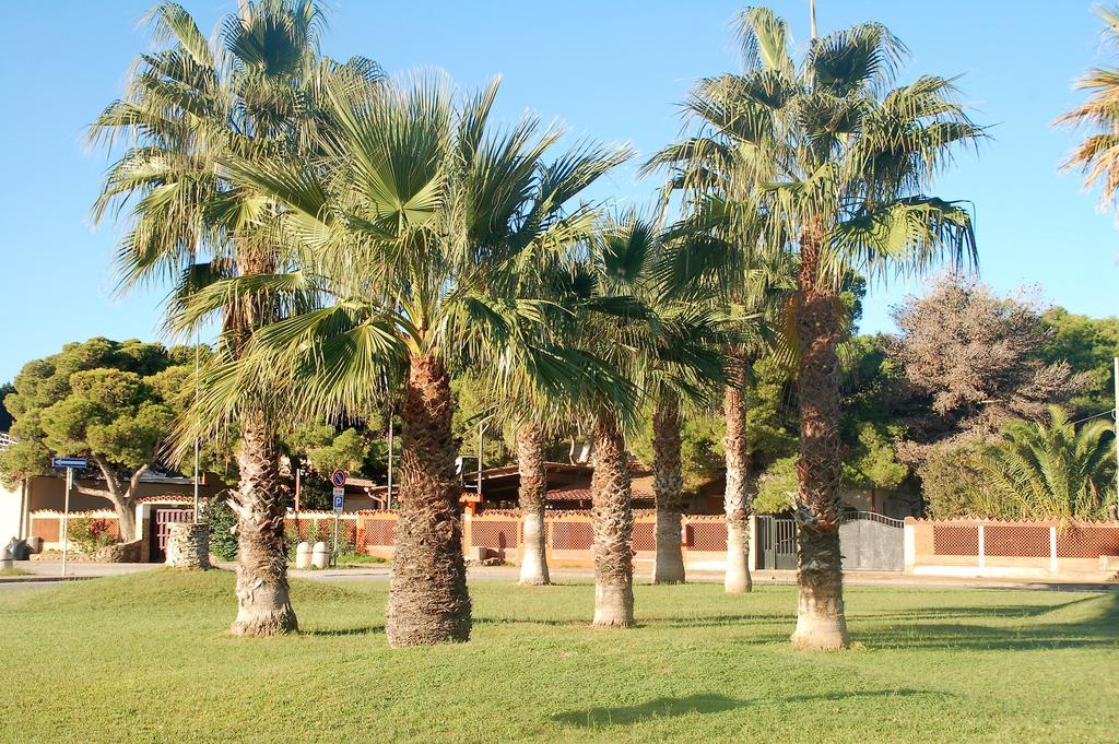Apartments Casa Vacanze Porto Pino Buitenkant foto